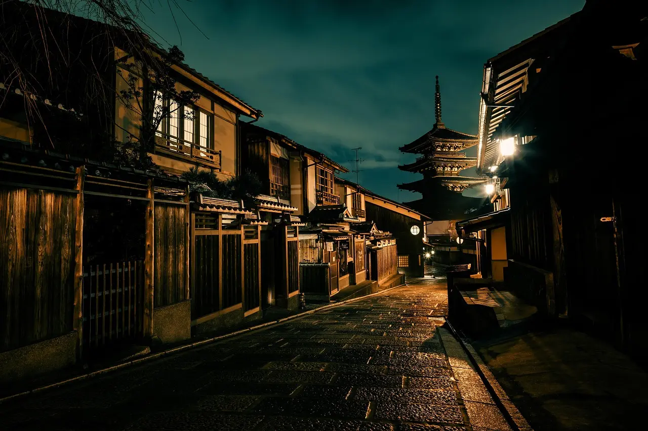 Yamaboko float procession during Gion Matsuri — a defining moment of cultural experience through local festivals and folk performances in Japan Elaborate wooden float with gold leaf and silk banners during Gion Matsuri parade in Kyoto